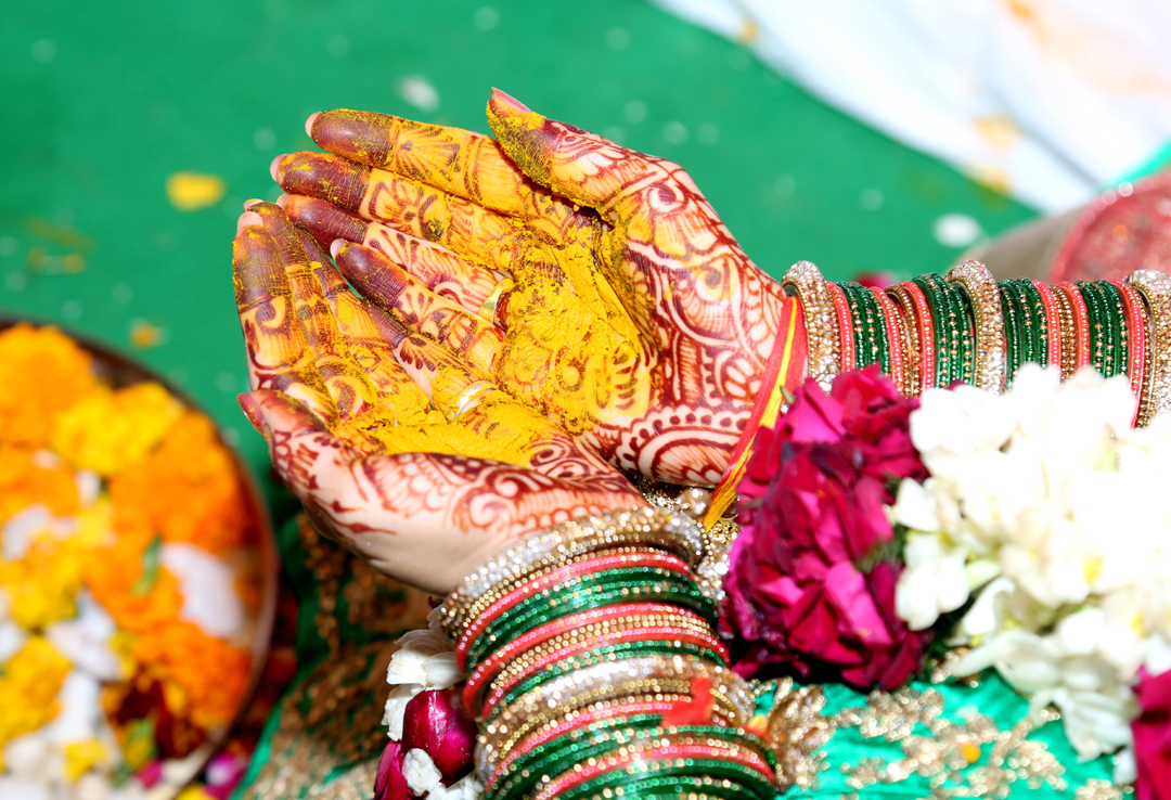 Hindu Rituals haldi on bride's hands havan phere